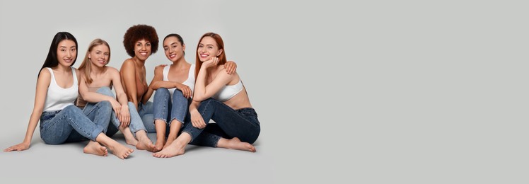 Image of Portrait of beautiful young women on light background. Banner design with space for text