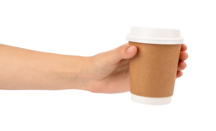 Woman holding takeaway paper coffee cup on white background, closeup