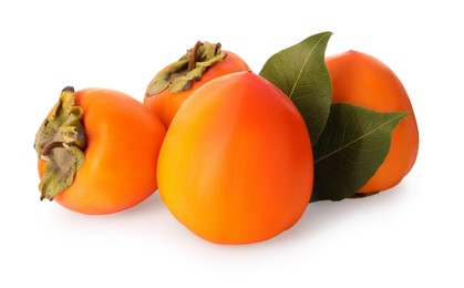 Delicious ripe juicy persimmons on white background