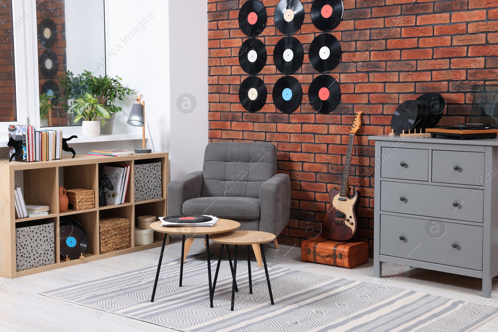 Photo of Living room decorated with vinyl records. Interior design