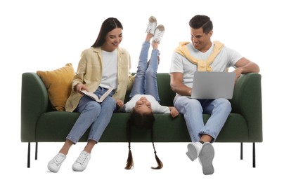 Happy family resting on comfortable green sofa against white background