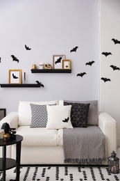 Photo of Modern room decorated for Halloween. Idea for festive interior