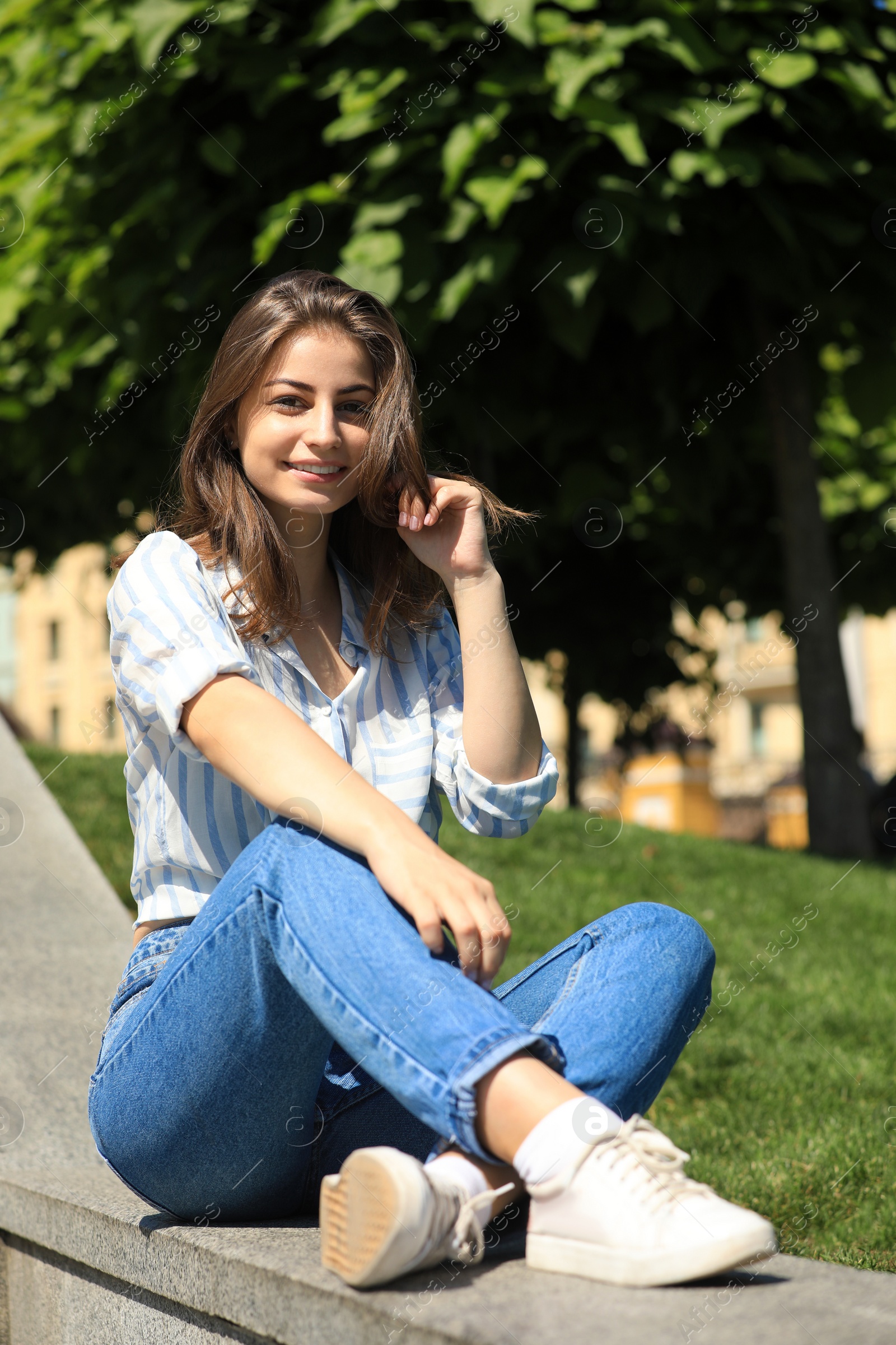 Photo of Beautiful young woman outdoors on sunny day