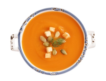 Bowl of tasty sweet potato soup isolated on white, top view