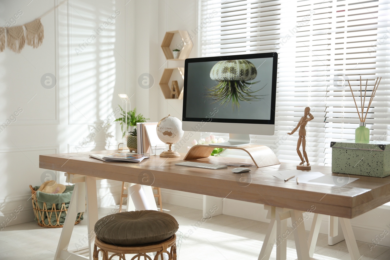 Photo of Stylish home office interior with comfortable workplace