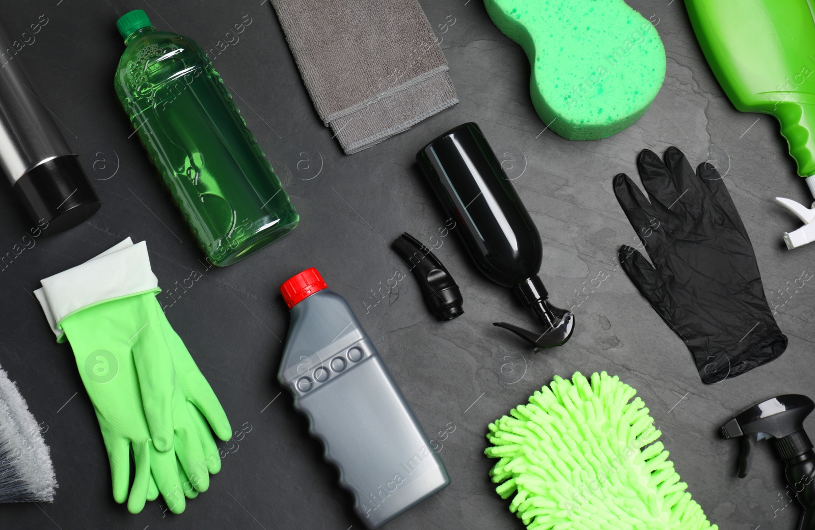 Photo of Flat lay composition with car cleaning products on grey table
