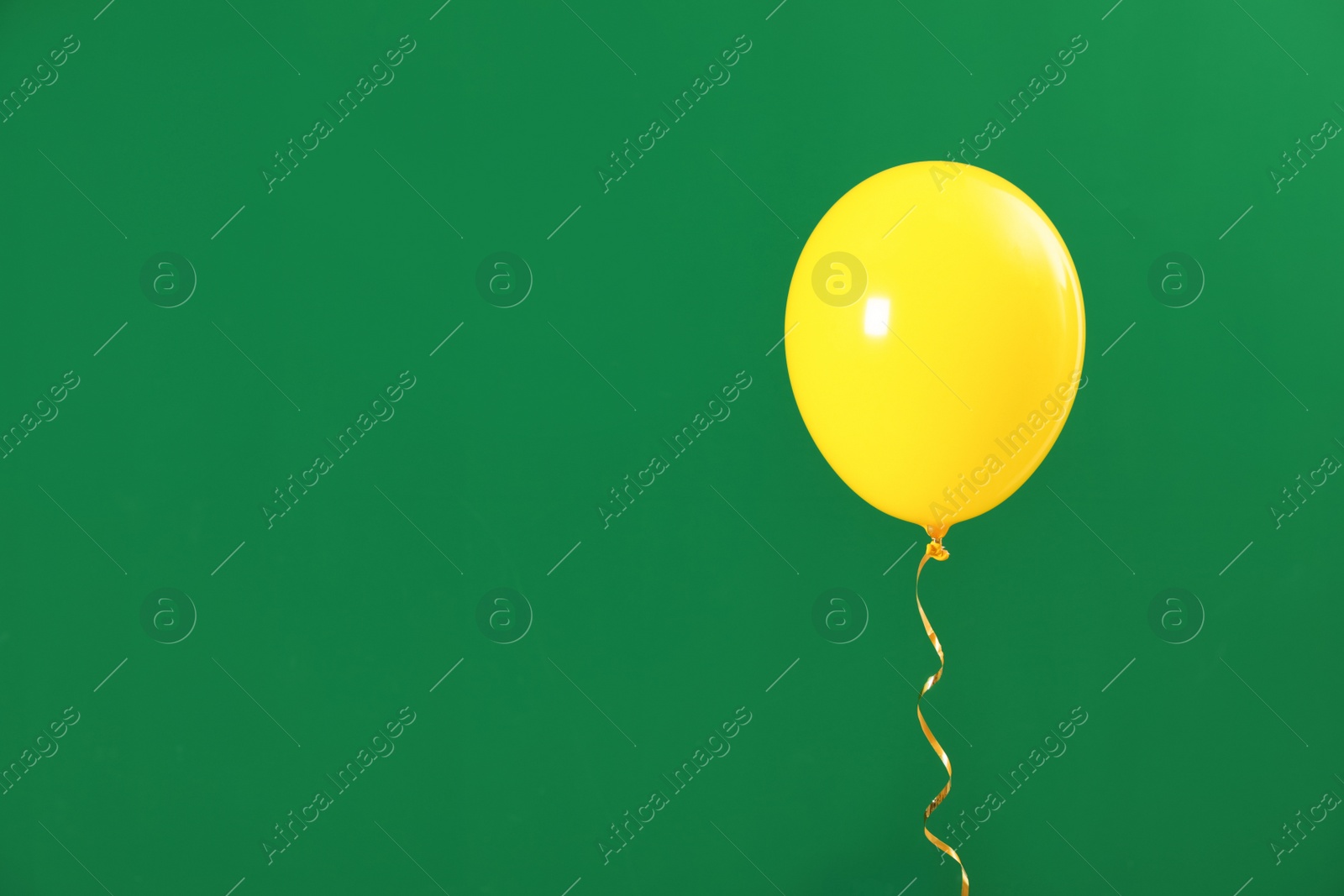 Photo of Bright balloon on color background, space for text. Celebration time