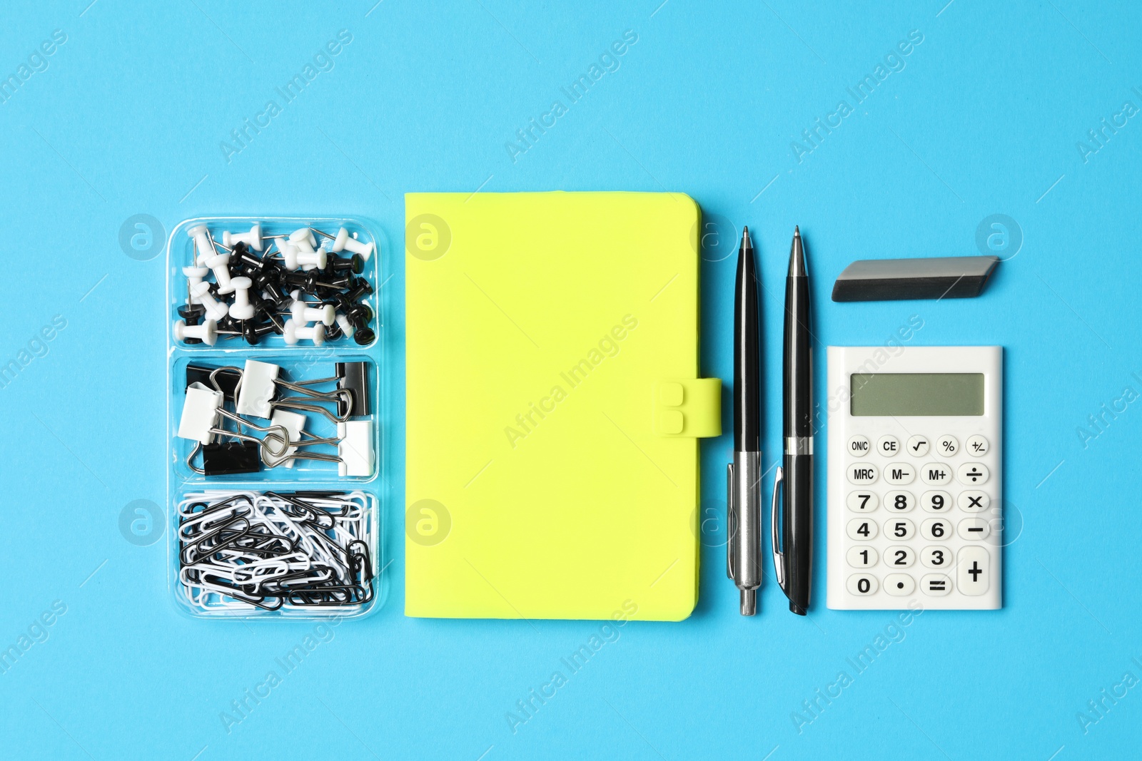 Photo of Different stationery on light blue background, flat lay. Back to school