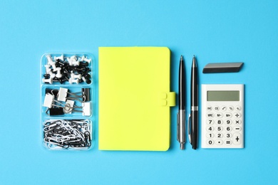 Photo of Different stationery on light blue background, flat lay. Back to school