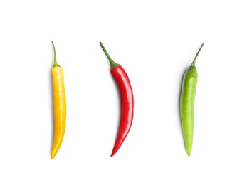 Image of Set with different hot chili peppers on white background