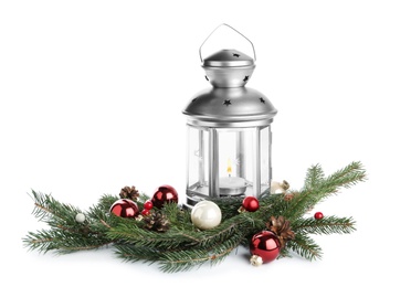 Lantern and Christmas decorations on white background