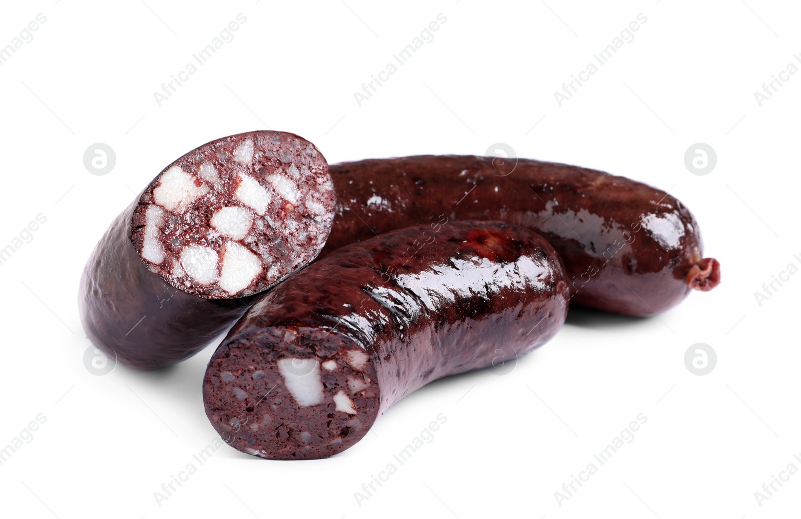 Photo of Cut and whole tasty blood sausages on white background