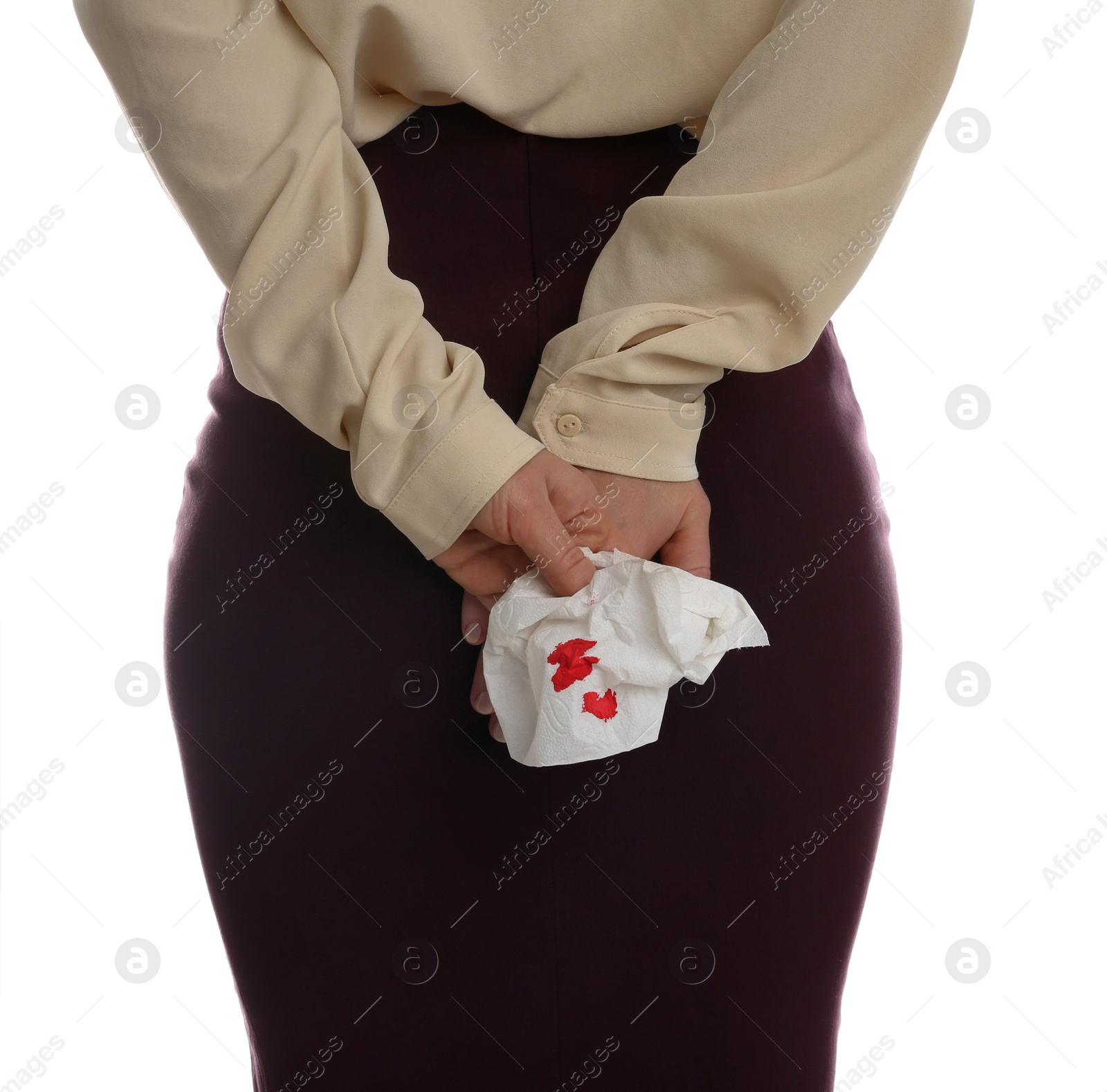 Photo of Woman holding toilet paper with blood stain on white background, closeup. Hemorrhoid concept