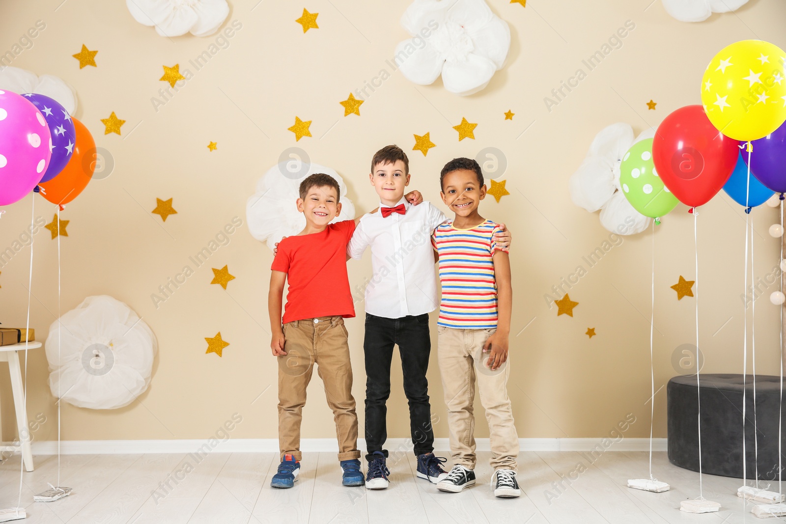 Photo of Adorable little boys at birthday party indoors