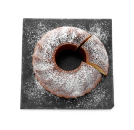 Photo of Homemade yogurt cake with powdered sugar on white background, top view