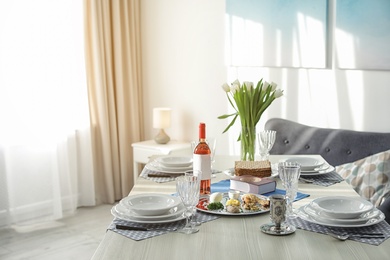 Photo of Table served for Passover (Pesach) Seder indoors