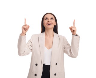 Photo of Beautiful businesswoman in suit pointing at something on white background