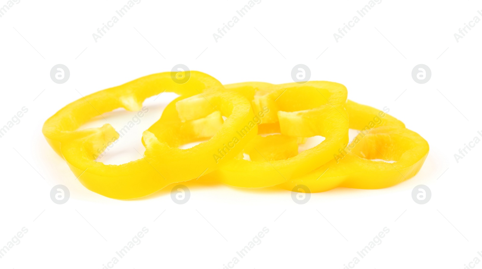 Photo of Rings of yellow bell pepper isolated on white