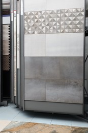 Photo of Many different samples of tiles on display in store