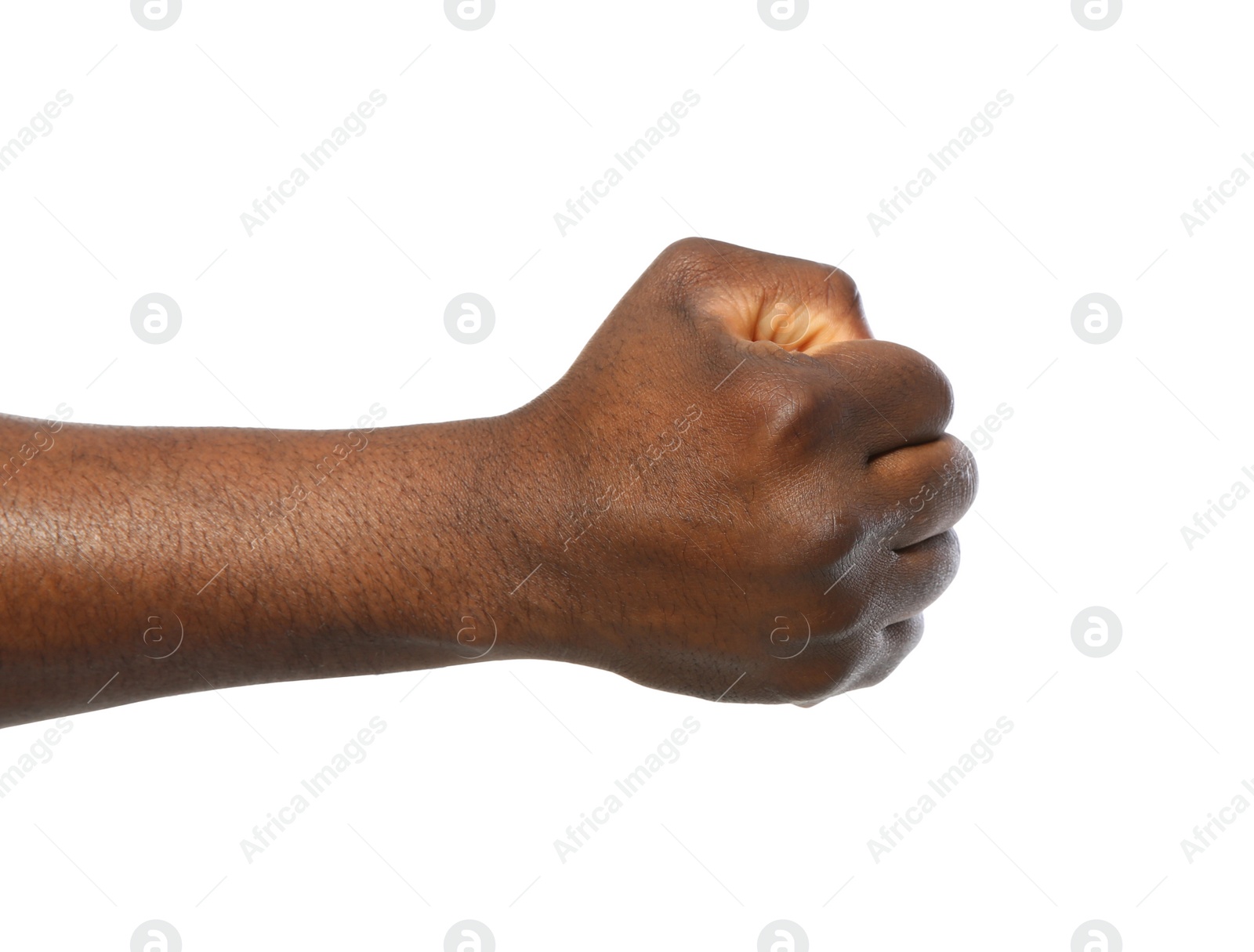 Photo of African-American man showing fist on white background, closeup