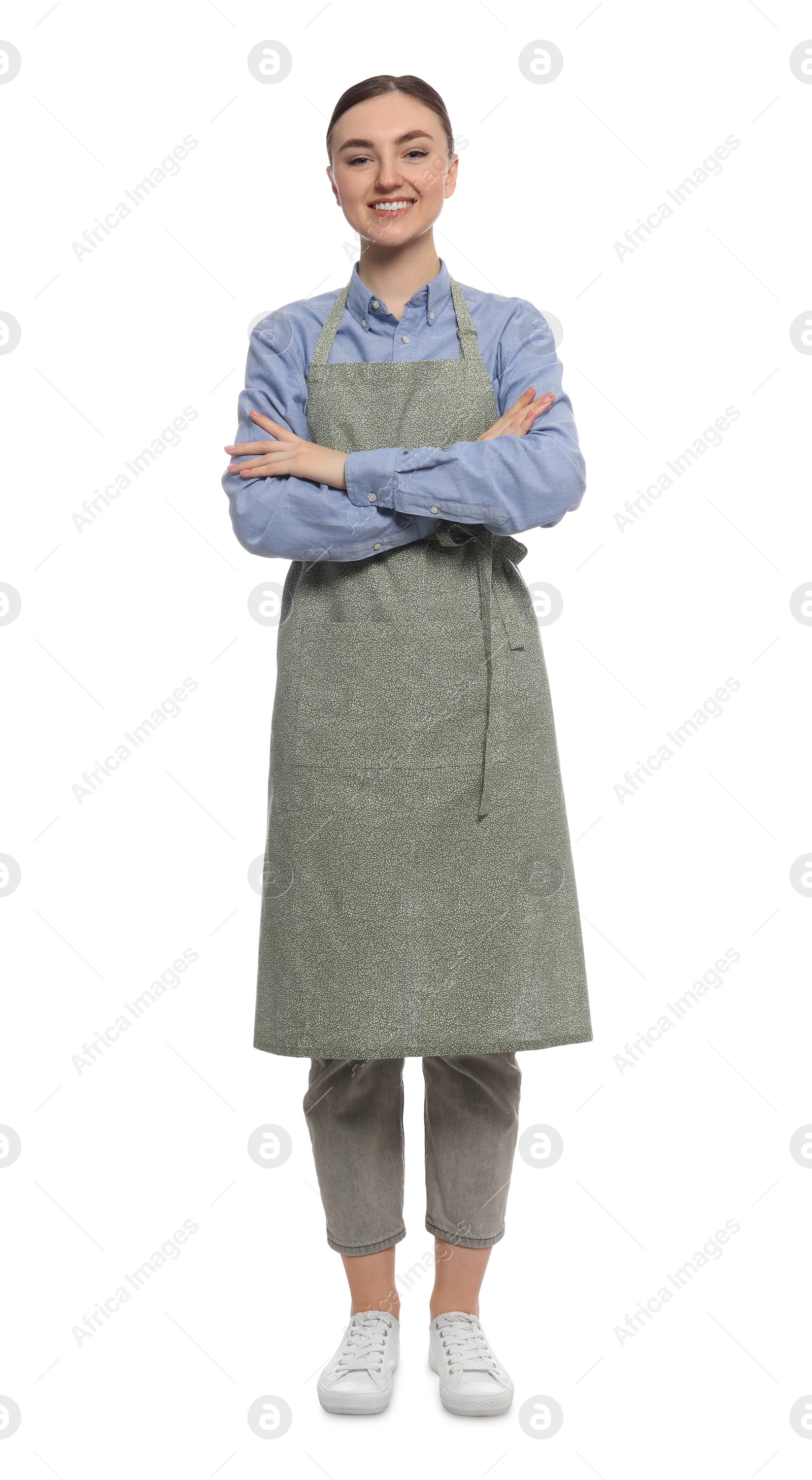 Photo of Beautiful young woman in clean apron on white background