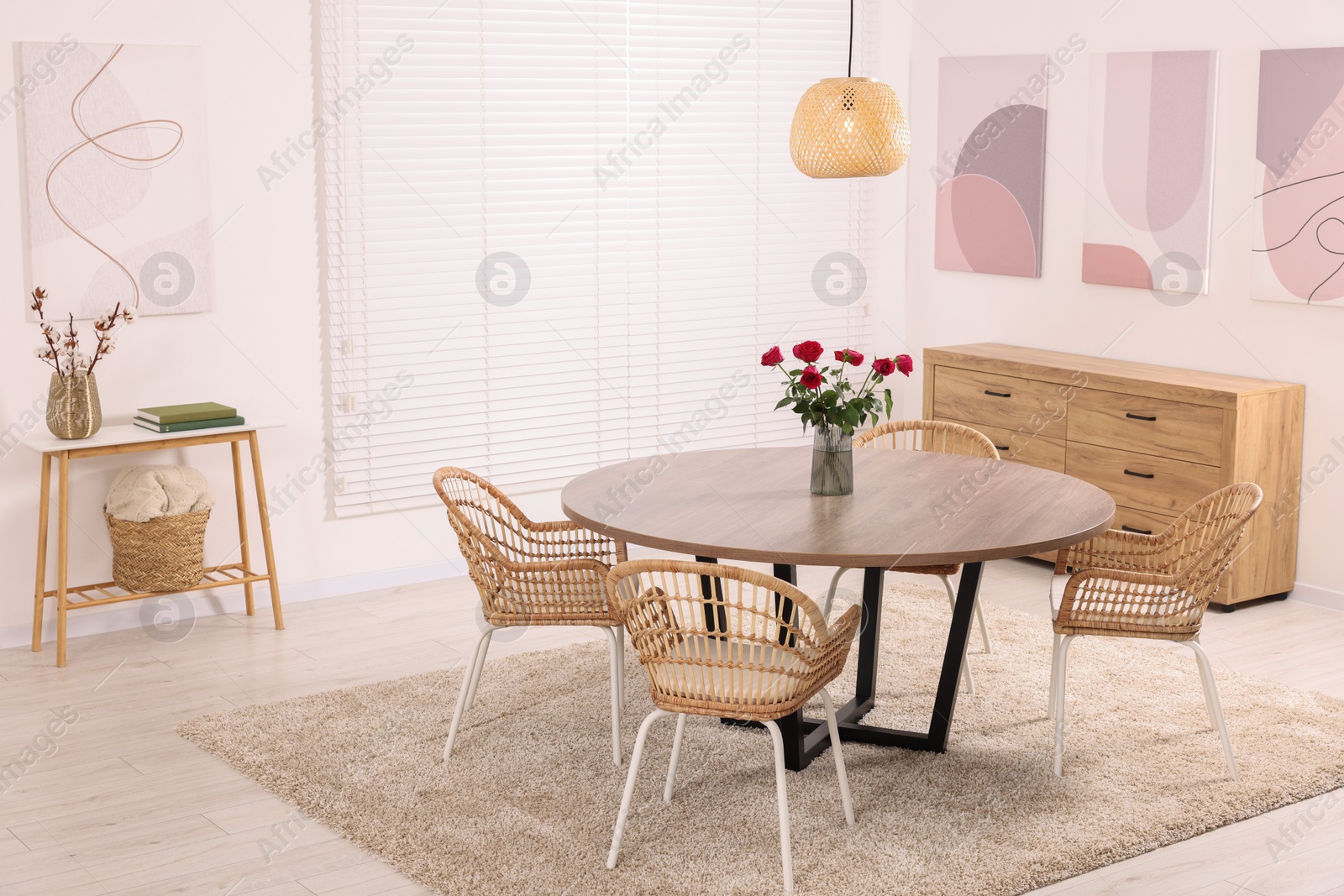 Photo of Stylish dining room interior with comfortable furniture