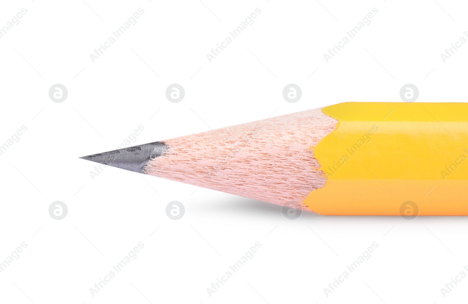 Photo of Sharp graphite pencil isolated on white. Macro photo