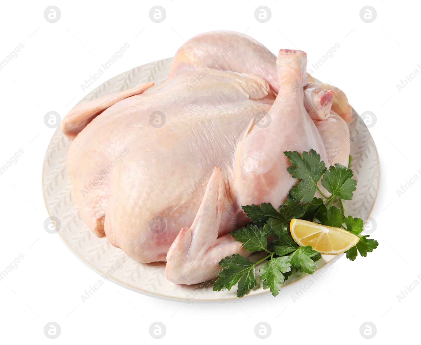 Photo of Fresh raw chicken with lemon and parsley isolated on white
