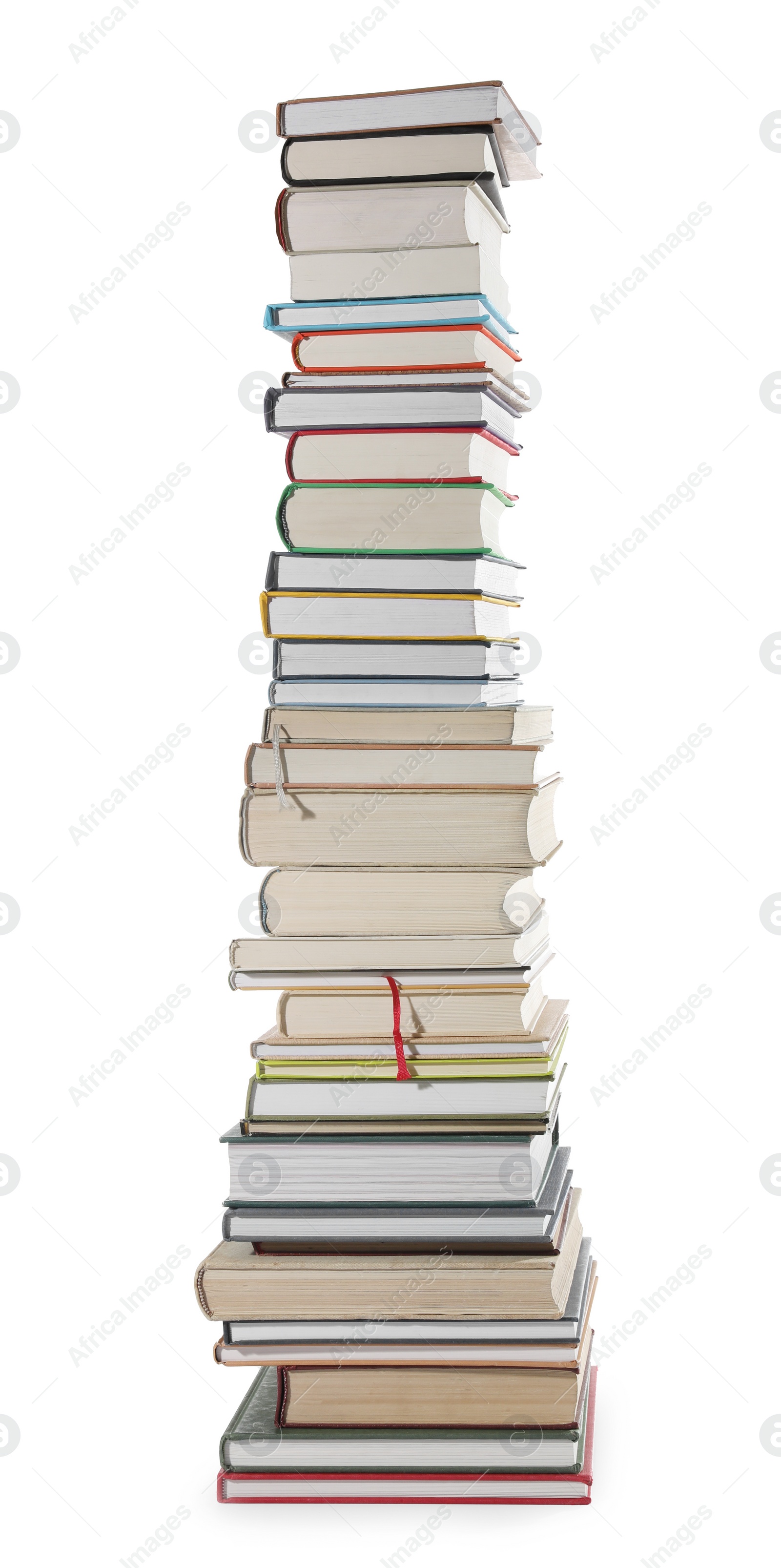 Photo of High stack of many different books isolated on white