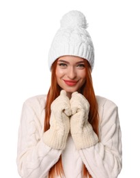 Photo of Young woman in hat and mittens on white background. Christmas celebration