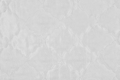 Photo of Modern white comfortable orthopedic mattress as background