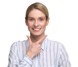 Woman showing her clean teeth and smiling on white background