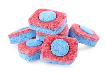Photo of Many dishwasher detergent tablets on white background