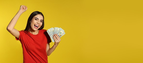 Image of Young woman with money on yellow background, space for text. Banner design