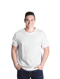 Photo of Young man in t-shirt on white background. Mockup for design