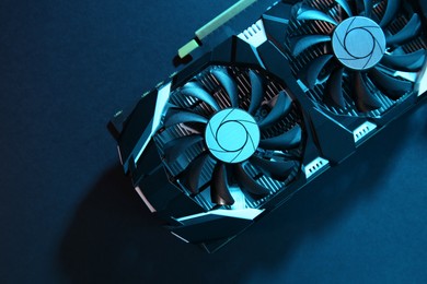 Photo of Computer graphics card on color background, top view