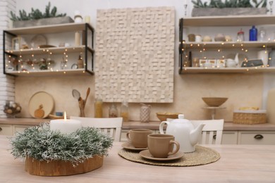 Photo of Kitchen interior with festive decor. Christmas celebration