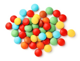 Photo of Many small colorful candies on white background, top view