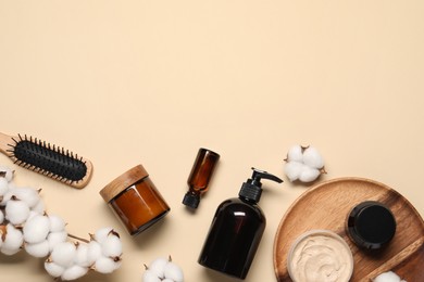 Bath accessories. Flat lay composition with personal care products on beige background, space for text