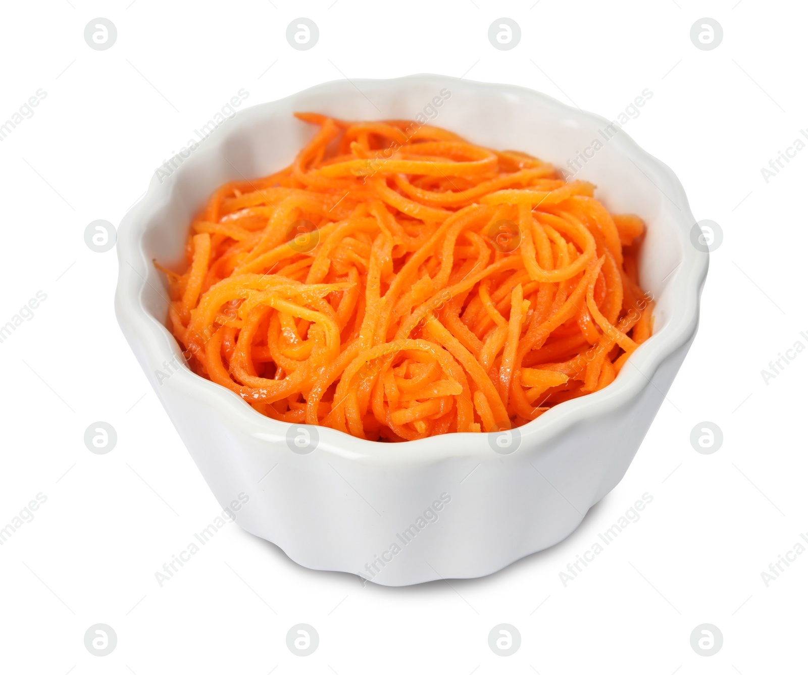 Photo of Delicious Korean carrot salad in bowl isolated on white