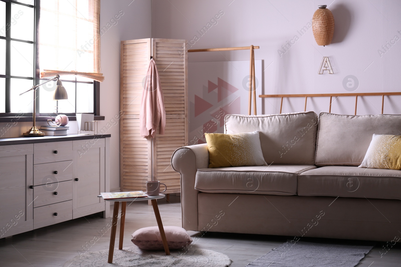 Photo of Modern living room interior with comfortable sofa