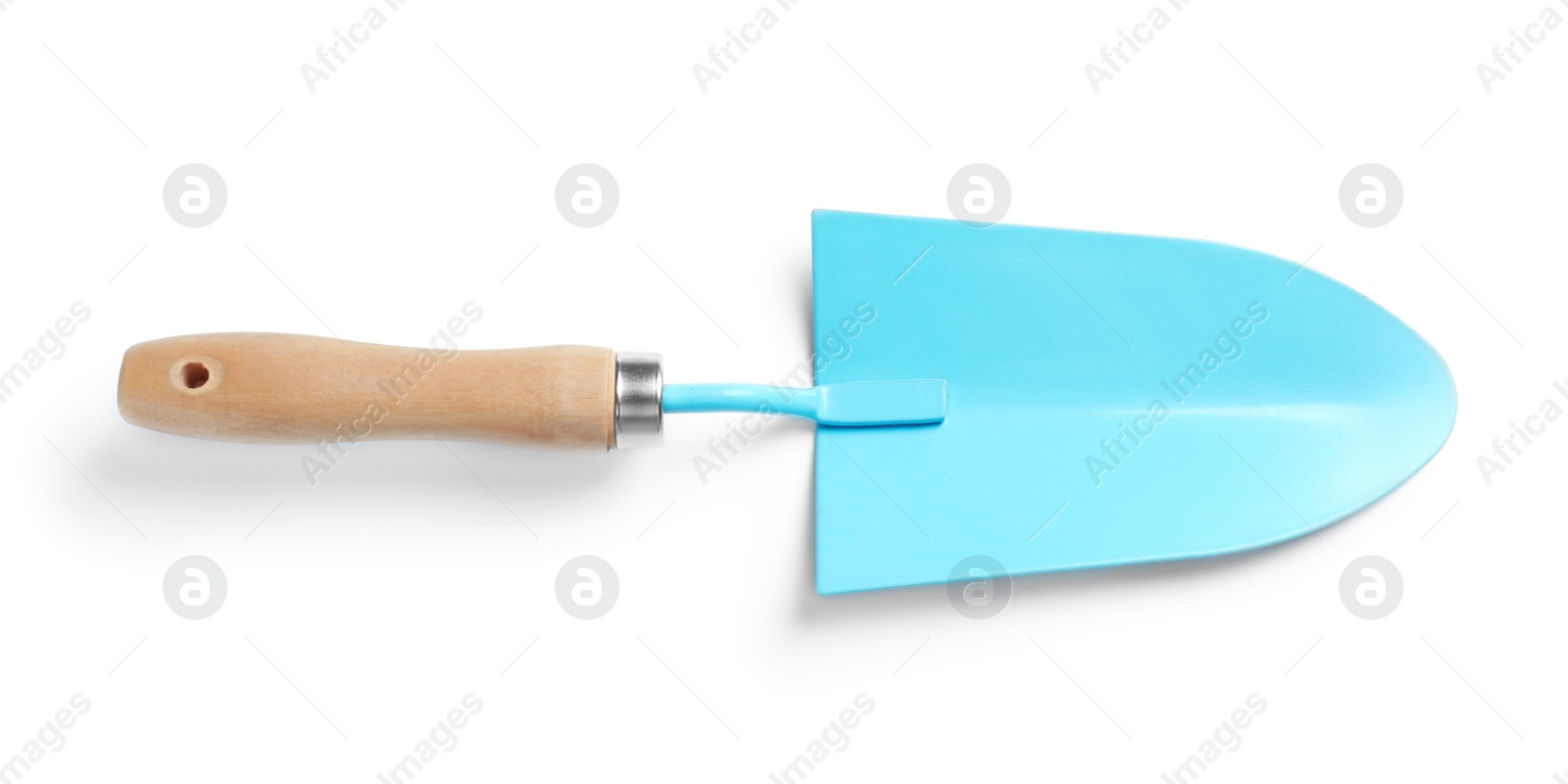 Photo of New trowel on white background. Professional gardening tool