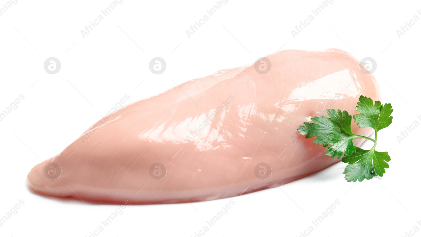 Photo of Raw chicken breast with parsley on white background