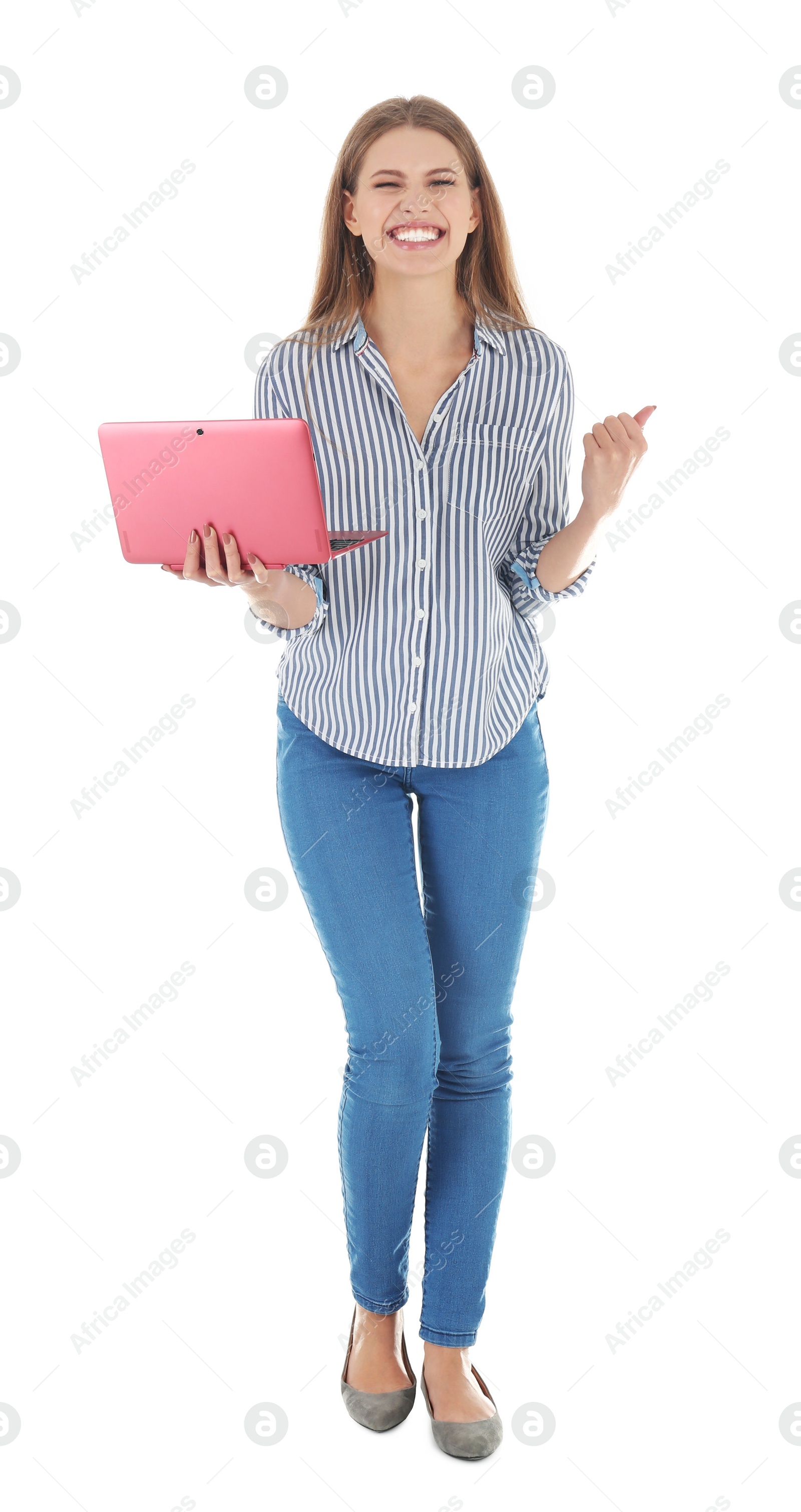 Photo of Emotional young woman with laptop celebrating victory on white background