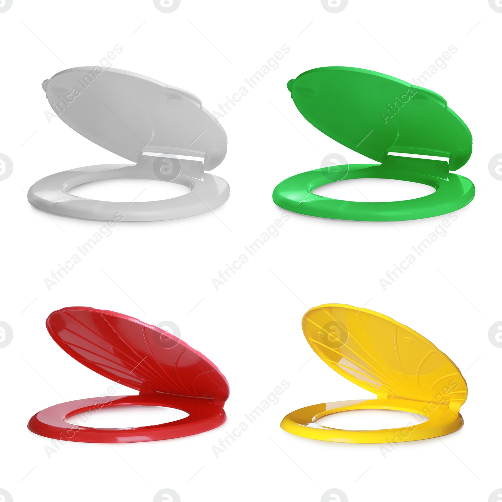 Image of Set with different plastic toilet seats on white background