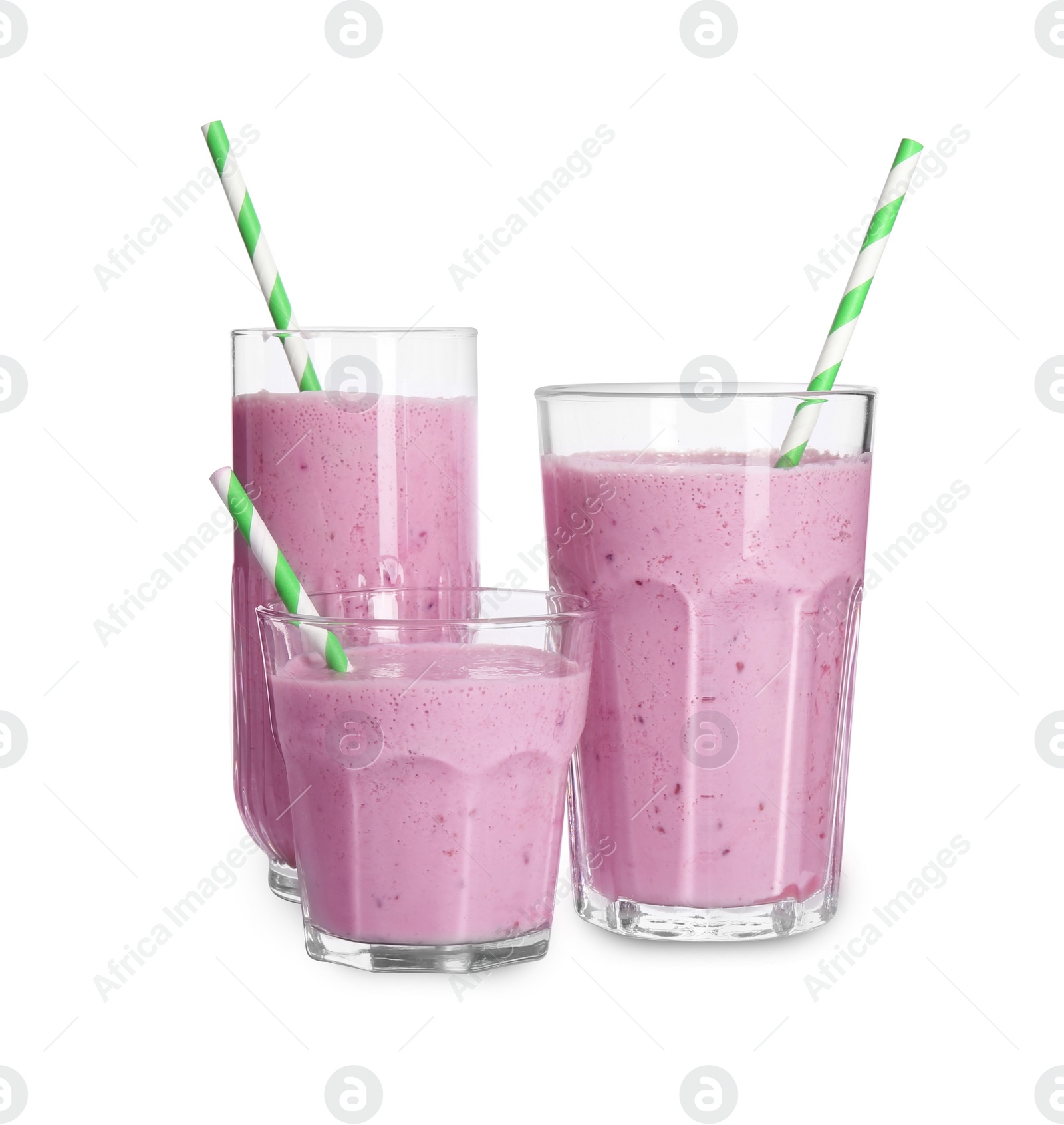 Photo of Glasses of blackberry smoothie with straws on white background