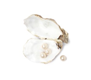 Photo of Open oyster shell with pearls on white background