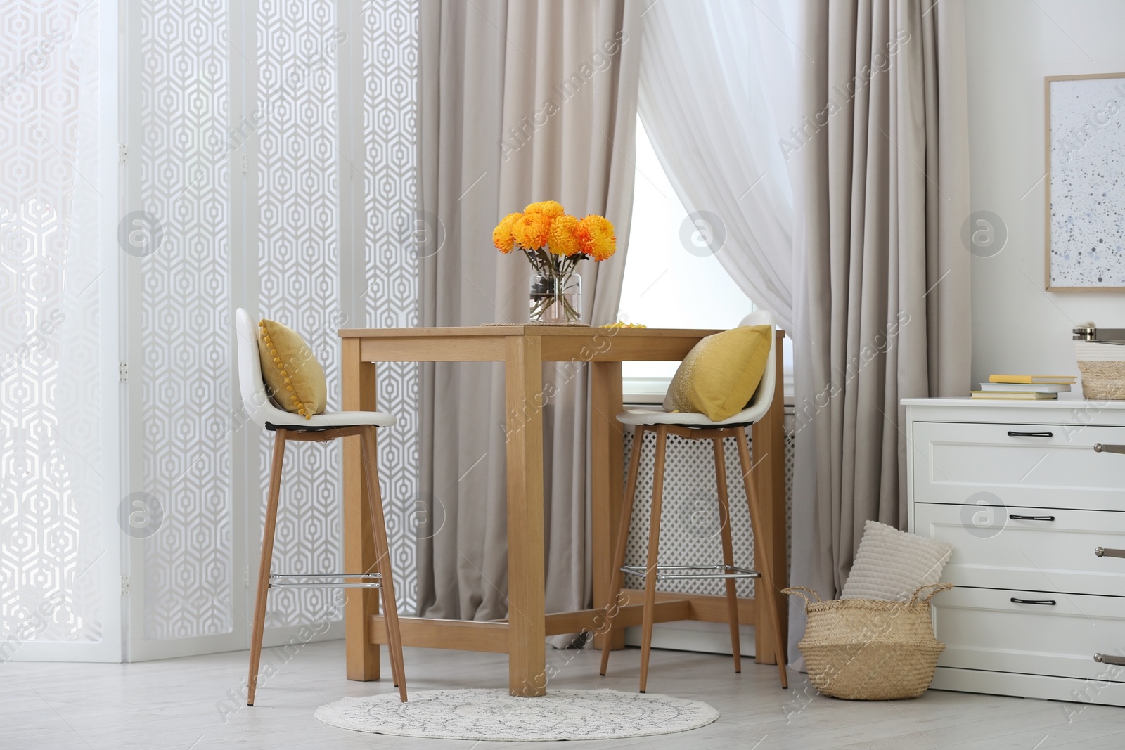 Photo of Beautiful curtains on window in stylish room interior