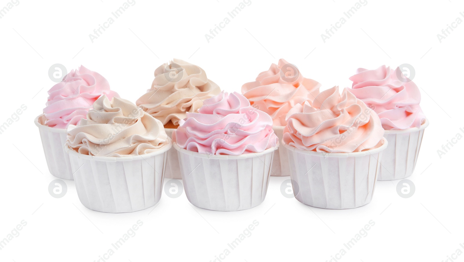 Photo of Tasty cupcakes with cream isolated on white