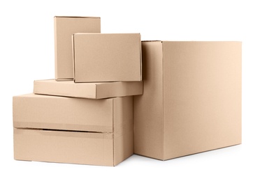 Pile of cardboard boxes on white background